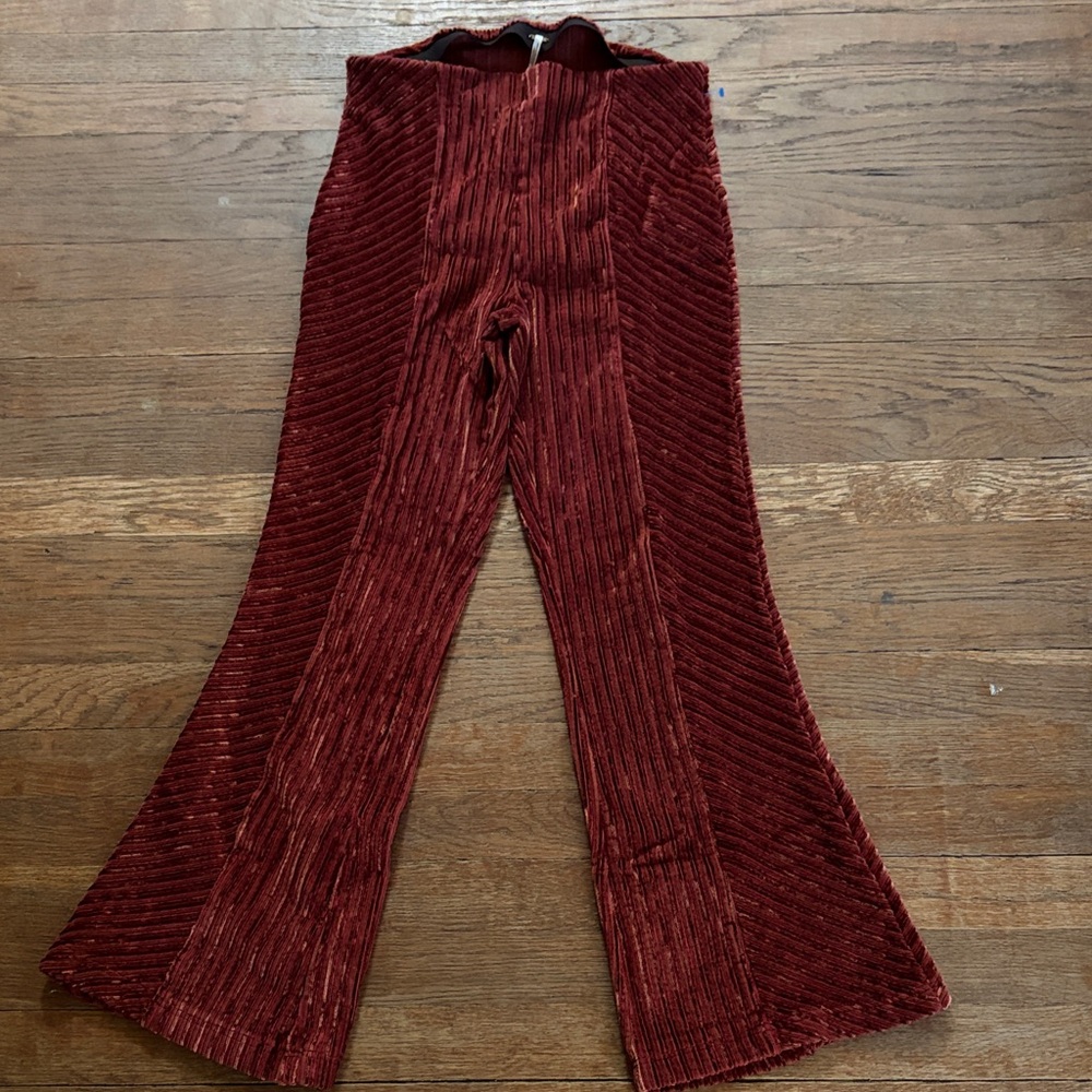 Free People Ribbed Velvet Flare Pants in Wine Red